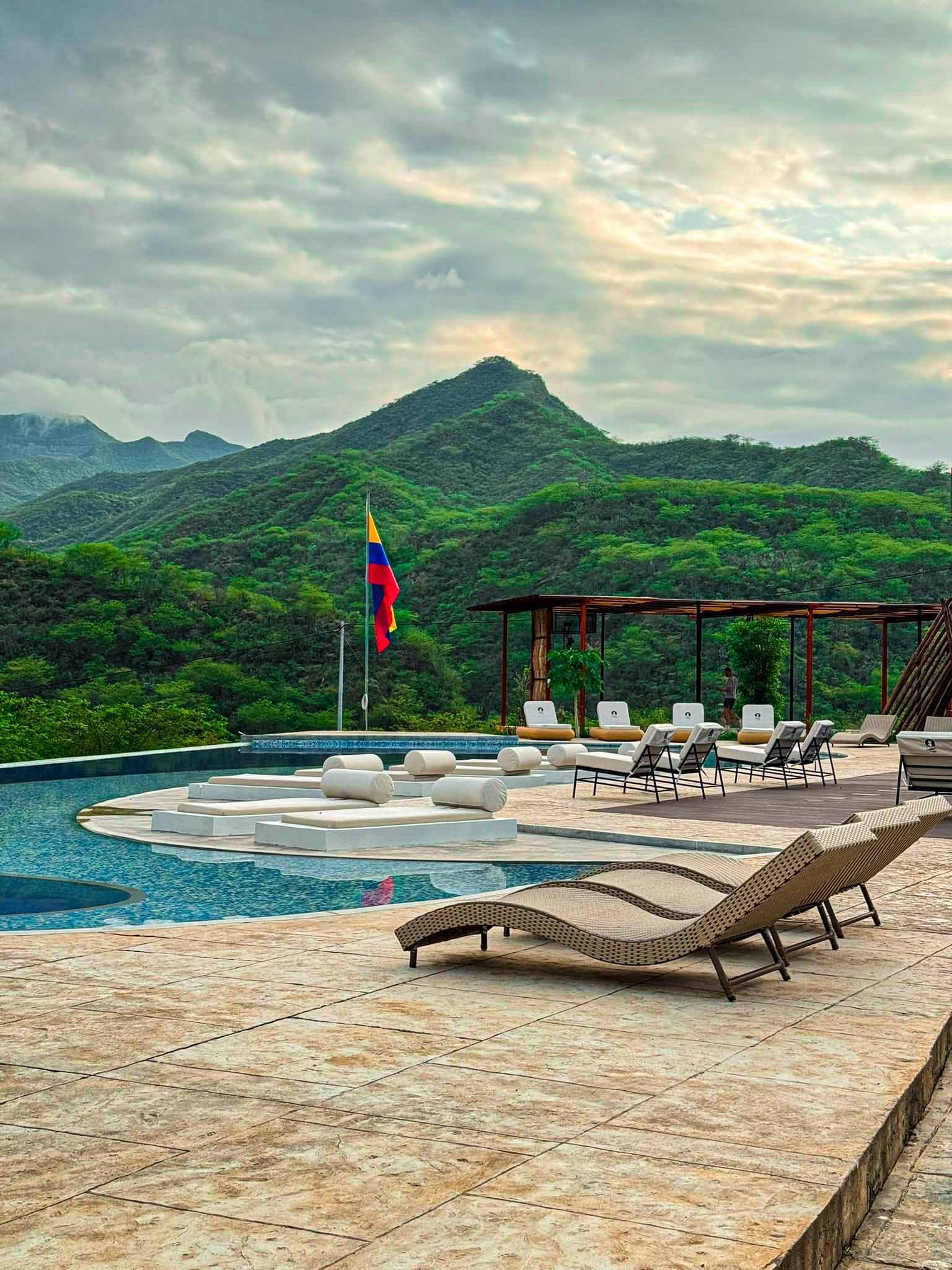 Infinity pool Colombia flag mountain views - Biohotel tropical dry forest Nariño